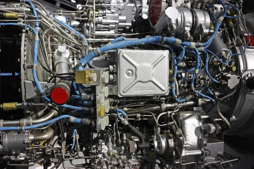 Aircraft engine-bay wiring harness under inspection
